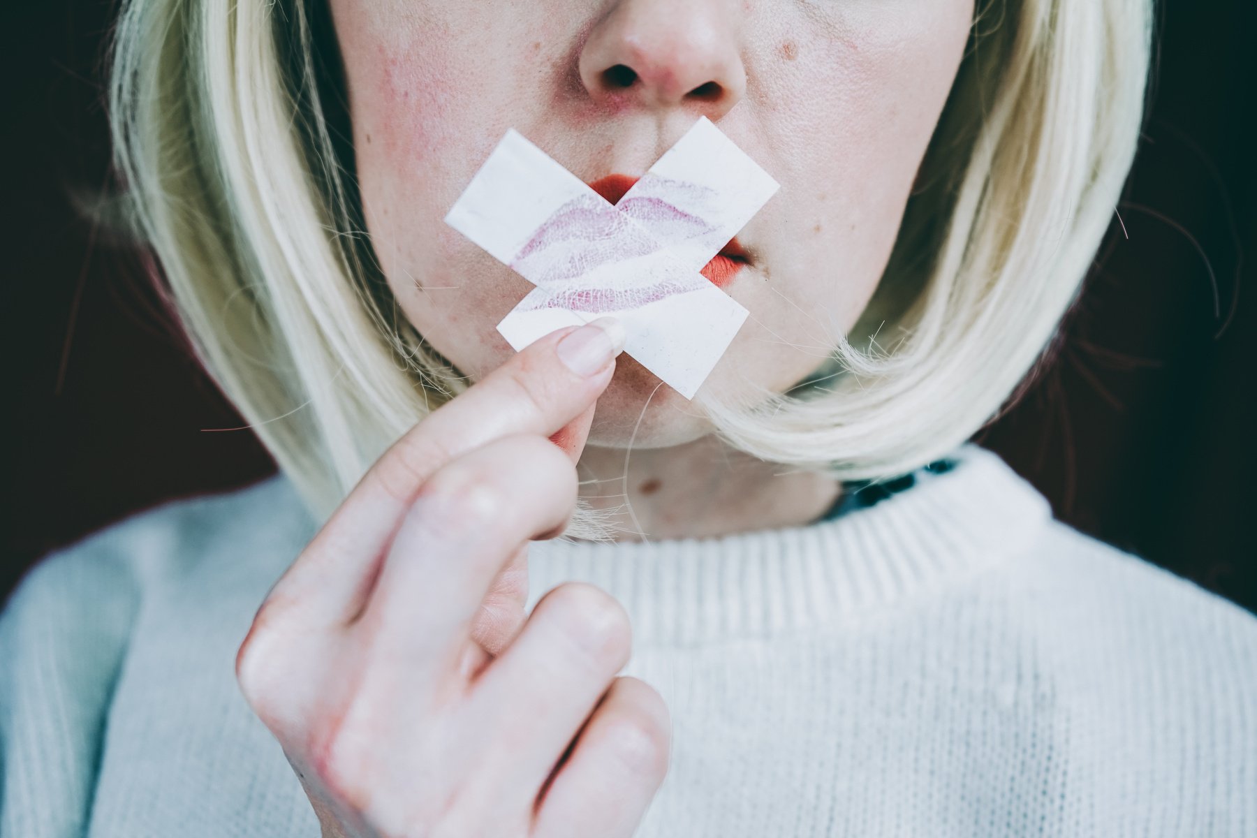 Artistic Portrait of Woman Holding a Cross With a Kiss Print